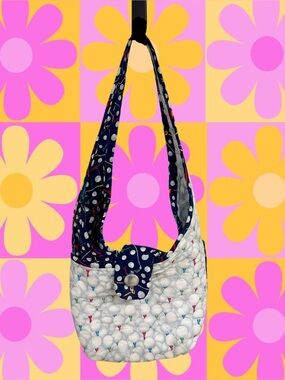 Quilted reversible golf balls and tees shoulder bag